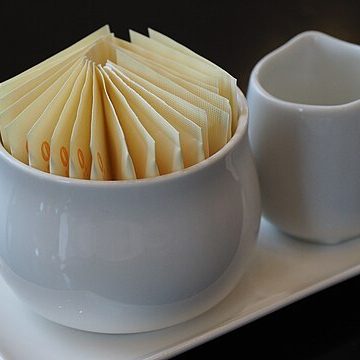 sugar in packets: Credit Wikimedia Commons Repackaged sugar like these sell in Kenya